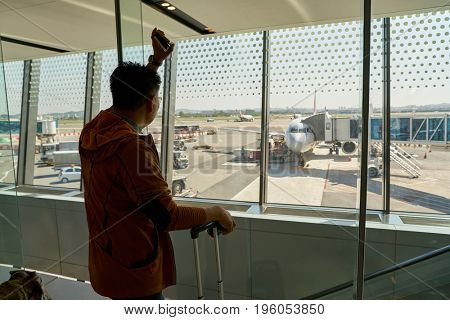 SEOUL, SOUTH KOREA - CIRCA MAY, 2017: man at Gimpo Airport Domestic Terminal. Gimpo International Airport is located in the far western end of Seoul.