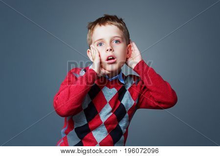 surprised boy listening to something, isolated