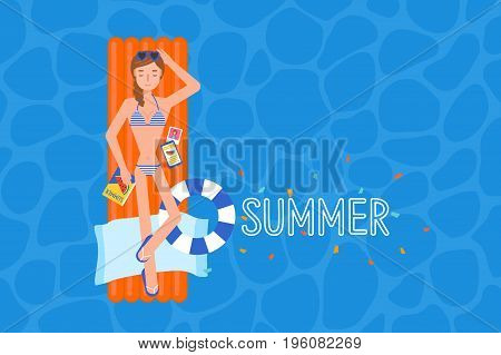 The bikini girl on the airmattress at the swimmingpool.