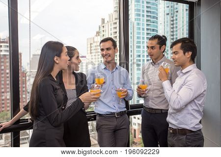 Businessman Holing Glass For Drinking With Business Discussion Mini Party For Business And A Group O