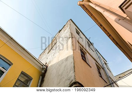 View From Bottom Of Abandoned Apartment Buildings