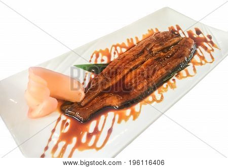 Japanese Grilled eel with teriyaki sauce unagi with pickled ginger white background