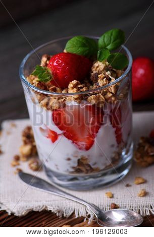 Glass With Joghurt Granola And Strawberries. Healthy Food