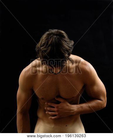 Portrait of a muscular man on black background
