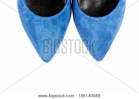 Pair of shoes isolated on white background. Blue female shoes showing toecaps only. Formal footwear closeup. Accessories for women. Fashion and beauty concept.