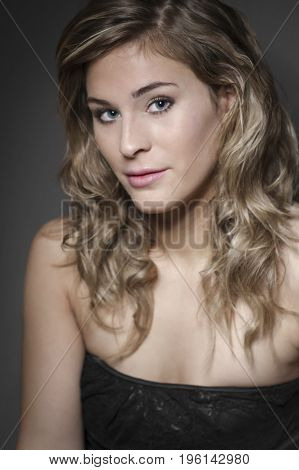 Portrait of a young, blond woman, serious