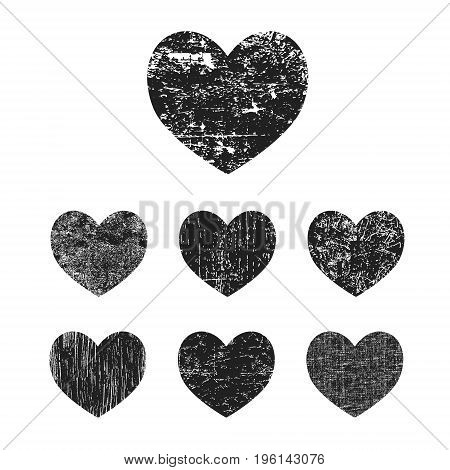 Grunge heart collection. Set of black grunge hearts isolated on white background. Vector illustration.