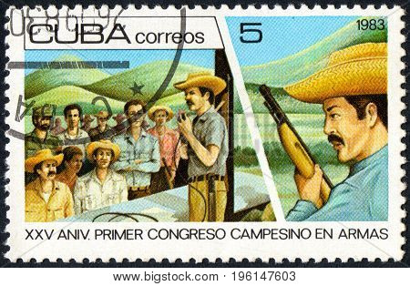 UKRAINE - CIRCA 2017: A postage stamp printed in Cuba shows Farmers from the series 25th anniversary of the Congress of the armed farmers circa 1983