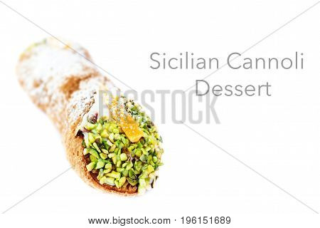 Cannoli Siciliani isolated on white - traditional dessert stuffed with ricotta cream and pistachios close up