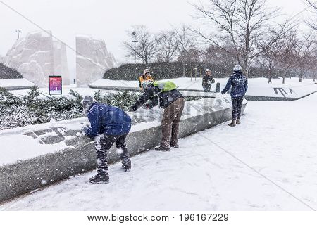 Washington Dc, Usa - January 7, 2017: Winter Snow Storm With People Playing By Martin Luther King Jr