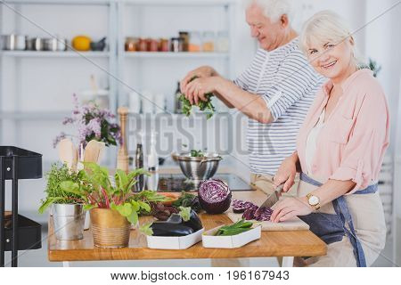 Senior Couple Making Salad