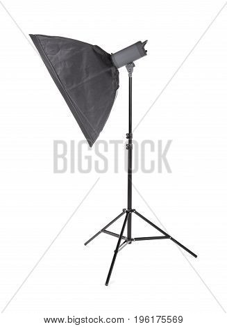 Professional studio flash with soft-box, isolated on a white background. Photo studio equipment. Pulse studio flashes with a square softbox. Outbreak.