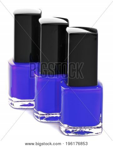 Three Shades of Purple Bright Nail Varnishes isolated on white background