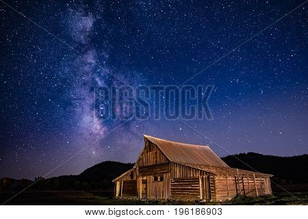 Milky way above T. A. Moulton's barn along Morman Row in Grand Teton National Park