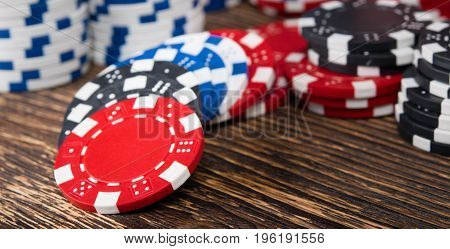 A set of money for playing cards on a wooden table