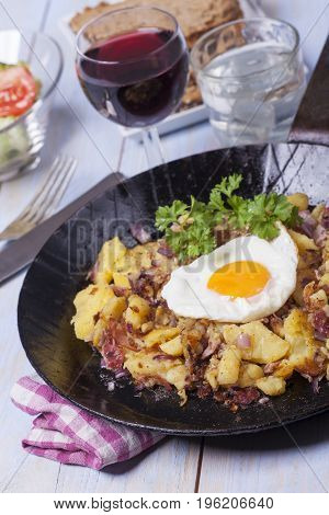 tiroler groestl a potato dish with an egg