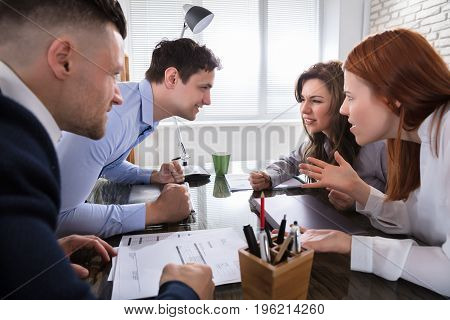 Business Coworker Arguing To Each Other At Workplace In Office