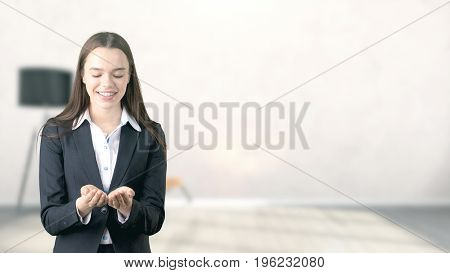 Young Beautiful Business Woman And Creative Designer Standing Over Blured Interior Background