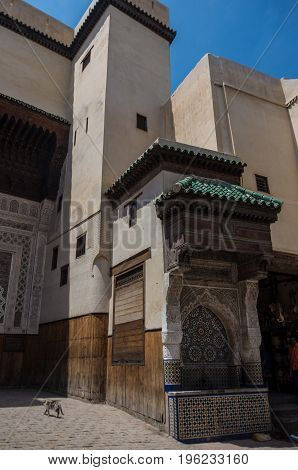 Fez, Morocco - May 9, 2017: Nejjarine fountain in medieval Fes medina Morocco