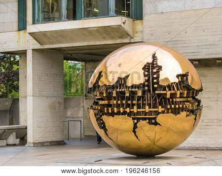 The Sphere Within Sphere, Sculpture Of The Italian Sculptor Arnaldo Pomodoro.trinity College, Dublin