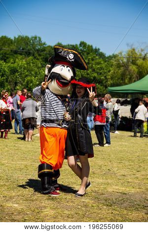 Couple Dressed In Pirate Costumes During Strawberry Festival