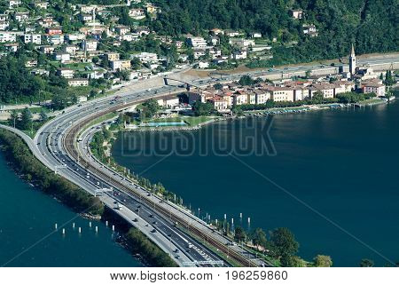 The Village Of Bissone On Lake Lugano