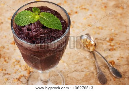 Acai Pulp In Glass With Fresh Mint And Muesli