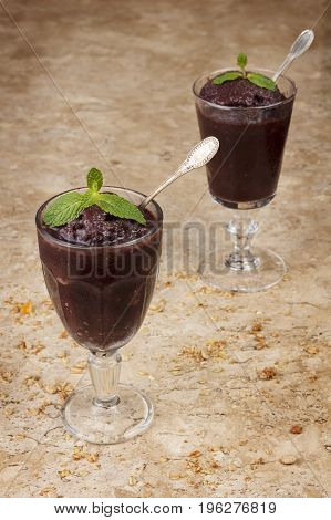 Acai Pulp In Glass With Fresh Mint And Muesli