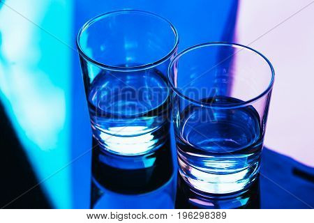 drinking glasses close-up on a dark background.