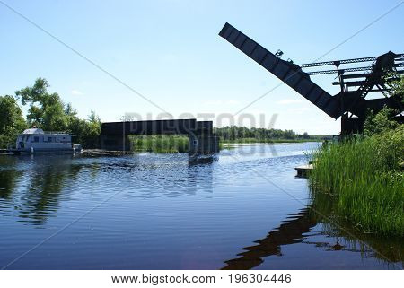 Historical lift bridge for train and boat passage on the riverway.