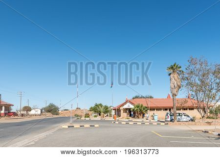 KARASBURG NAMIBIA - JUNE 13 2017: A street scene with the municipal building in Karasburg in the southern part of Namibia