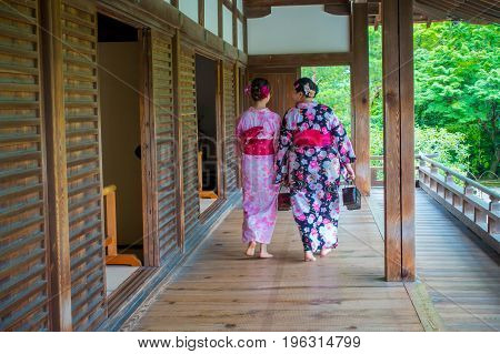 KYOTO, JAPAN - JULY 05, 2017: Unidentified people walking through the Hojo Hall of Tenryu-ji in the Arashiyama district of Kyoto.