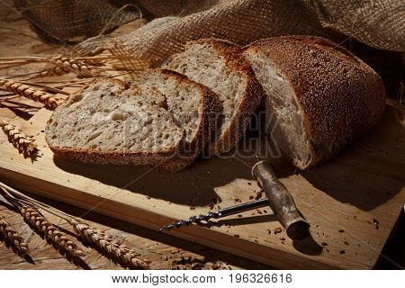 Rustic handmade bread on a wooden table