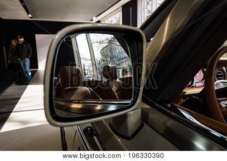 BERLIN - MARCH 08 2015: Showroom. Rear-view mirrors of a luxury car Rolls-Royce Phantom Drophead Coupe. Rolls-Royce Motor Cars Limited global manufacturer of luxury cars.