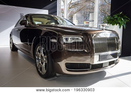 BERLIN - MARCH 08 2015: Showroom. Full-size luxury car Rolls-Royce Ghost. Rolls-Royce Motor Cars Limited global manufacturer of luxury cars.