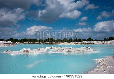 Man-made Artificial Lake Kaolin And White Land Containing Kaolinite Covered With Rain Water, Forming