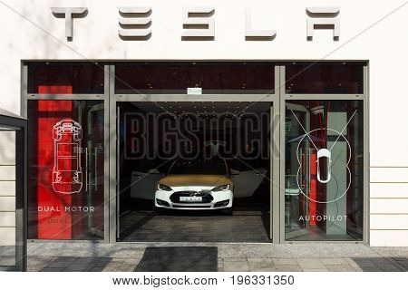 BERLIN - MARCH 08 2015: Showroom company of Tesla Motors on Kurfurstendamm. Tesla Motors Inc. is an American company that designs manufactures and sells electric cars.