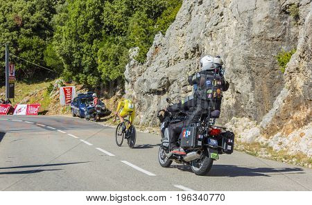 Col du Serre de TourreFrance - July 152016: The British cyclist Christopher Froome of Team Sky in Yellow Jersey is riding during an individual time trial stage in Ardeche Gorges on Col du Serre de Tourre during Tour de France 2016.