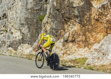 Col du Serre de TourreFrance - July 152016: The British cyclist Christopher Froome of Team Sky in Yellow Jersey is riding during an individual time trial stage in Ardeche Gorges on Col du Serre de Tourre during Tour de France 2016.