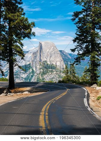 The road leading to Glacier Point in Yosemite National Park California USA with the Half Dome in the background.