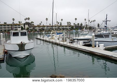 Recreational and fishing boats at the dock in Oxnard marina Ventura county Southern California Pacific coast; copy space