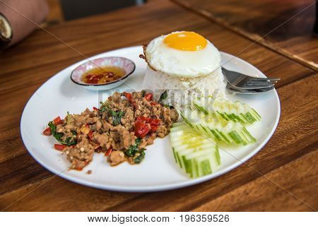Stir Fried Pork with Basil and Eggs with Fish Sauce and chili