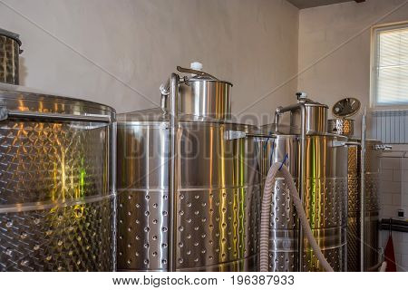 Modern winery plant with fermentaion stainless tanks for wine production