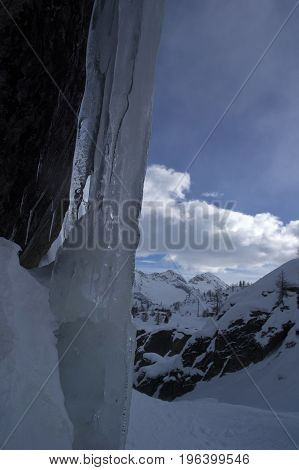 frozen waterfall in formazza valley during winter