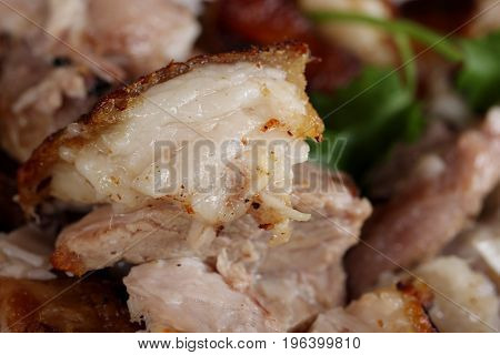 Close up of lard streaky belly roast recipe or german pork hocks.