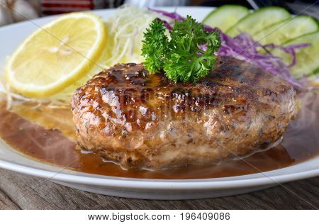 Japanese Style Hamberger Or Hamberg Serve With Gravy Sauce.