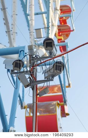 Video camera is monitoring the public order in the amusement park