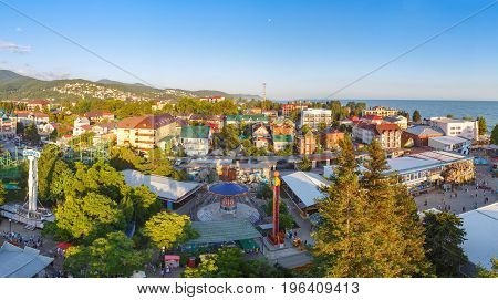 LAZAREVSKOE SOCHI KRASNODAR REGION JULY 5 2017: Panoramic view of the amusement park of Lazarevskoe city Sochi at sunset in summer