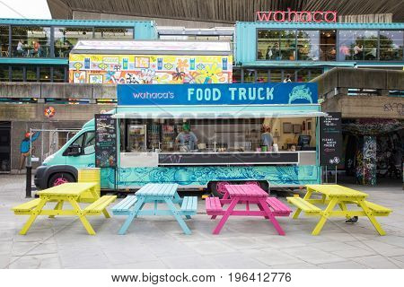 London, UK - 5 June 2017: Colourful food wagon on the Southbank. This is a popular arts area of galleries, theatres, bars and restaurants on the south bank of the River Thames in London. 