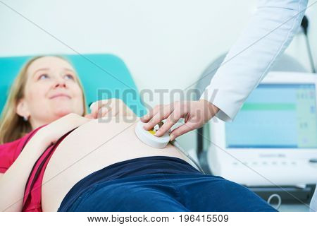 Pregnancy care. cardiotocography fetal heartbeat examination